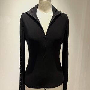 Jersey stretch zip front top with snap detail and hood